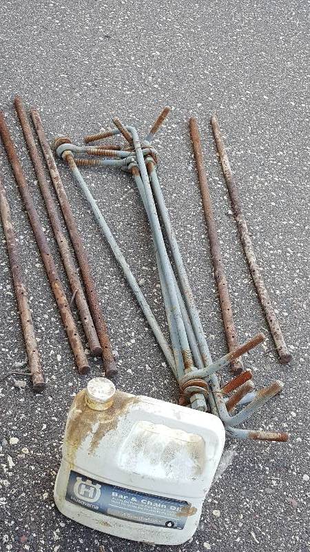 lot 8 image: Six metal rods, and six metal stakes