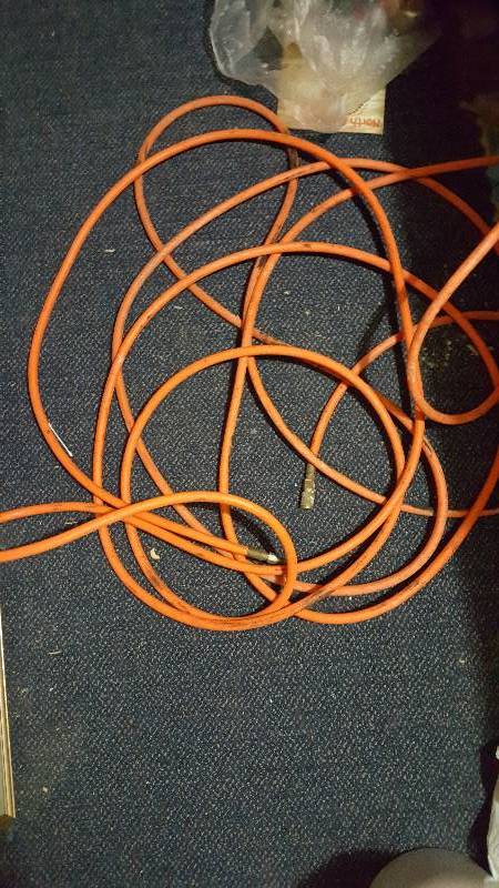 lot 20 image: Used orange air hose 54 feet long