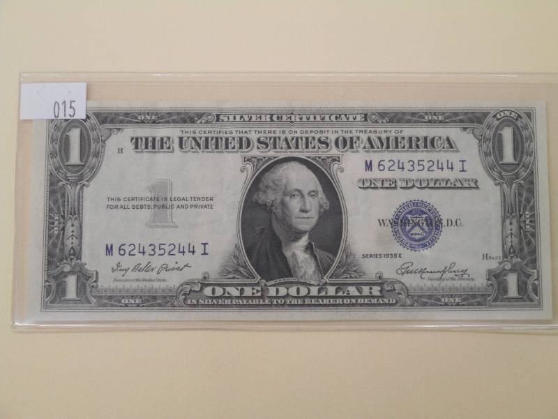 1935 E - One Dollar, $1.00 Silver C...