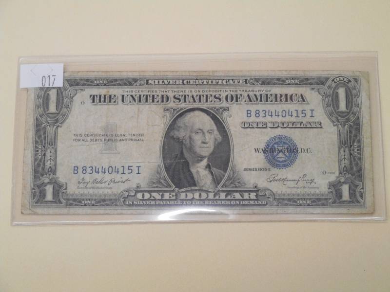 1935 E - One Dollar, $1.00 Silver C...
