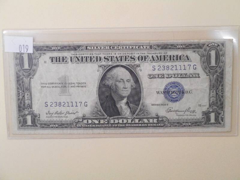 1935 E - One Dollar, $1.00 Silver C...