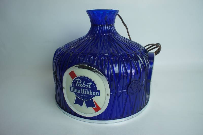 lot 1 image: Vintage Pabst Blue Ribbon Lighted Swag Lamp 14 in diameter.