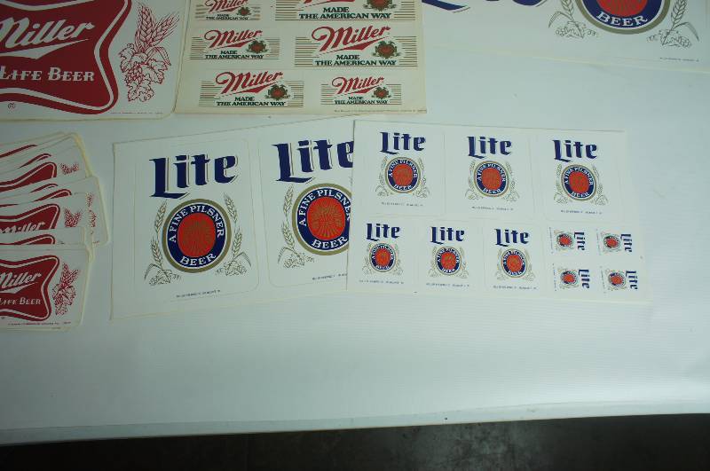 lot 40 image: Group of Miller High Life & Miller Lite unused stickers