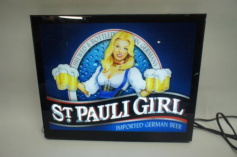 lot 46 image: St. Pauli Girl Neon lighted sign with a pretty barmaid 16 x 20