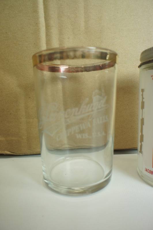 lot 81 image: Leinenkugels glass cylinder salt shaker and gold rimmed beer glass