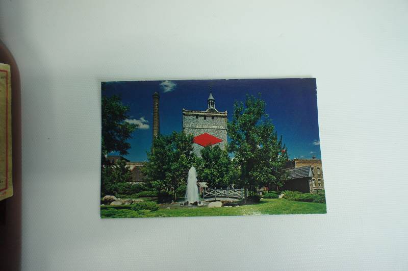 lot 82 image: Vintage Grain Belt paper label bottle & unused postcard