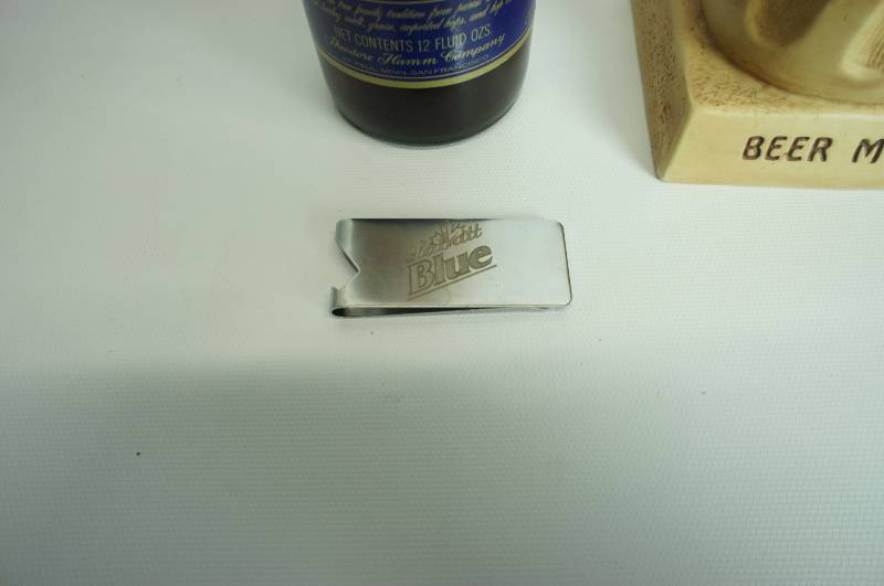 lot 85 image: Hamms paper label bottle, bank & Labatt money clip