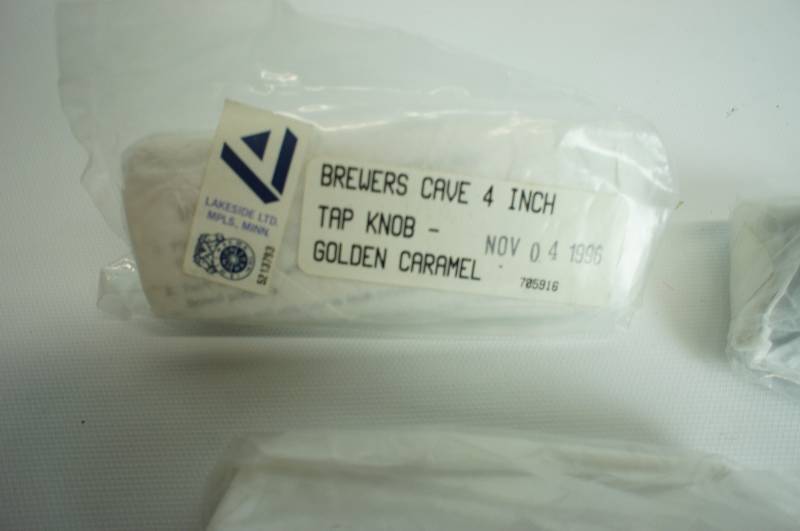 lot 106 image: Three different Brewers cave tap handles unused