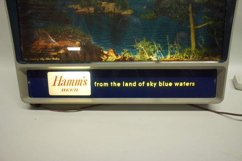 lot 108 image: Hamms Beer 56 rippler also called TV rippler in exc. Condition lights up, runs quiet and works like it should.  The case has one small chip on it.
