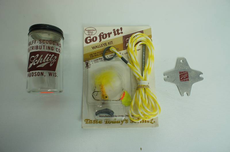 lot 70 image: Schlitz beer group cylinder glass salt shaker walleye kit and grill scraper