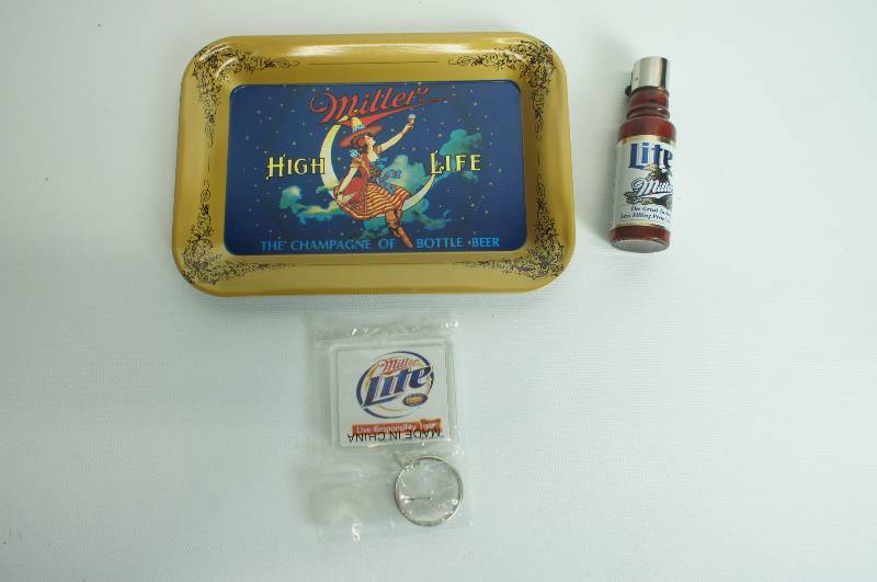 lot 75 image: Miller beer group lighter, key chain & Miller High Life tip tray unused