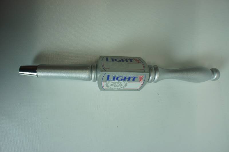 lot 100 image: Pabst Light tall tap handle unused