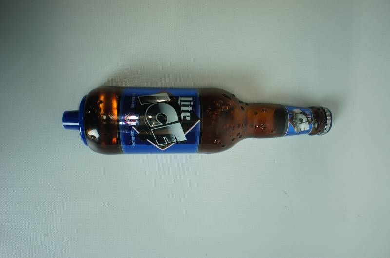 lot 101 image: Miller Ice Bottle shaped tape handle used