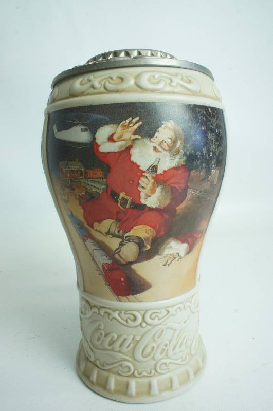 lot 165 image: CocaCola Seasons Greetings Christmas Stein