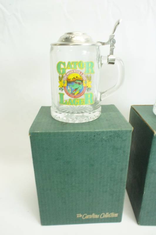 lot 196 image: Lot of (3) three Steins  Gator Ale, Weeping Radish, Pumpkin Ale
