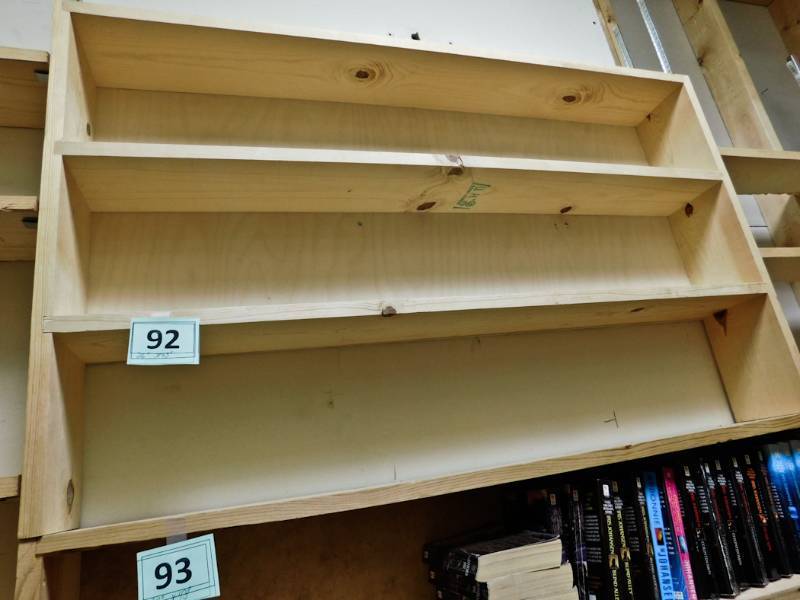 Back room overstock paperback bookshelves