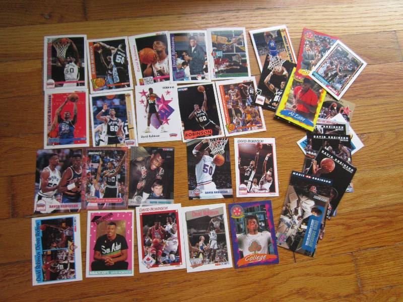lot 56 image: 40 David Robinson cards...