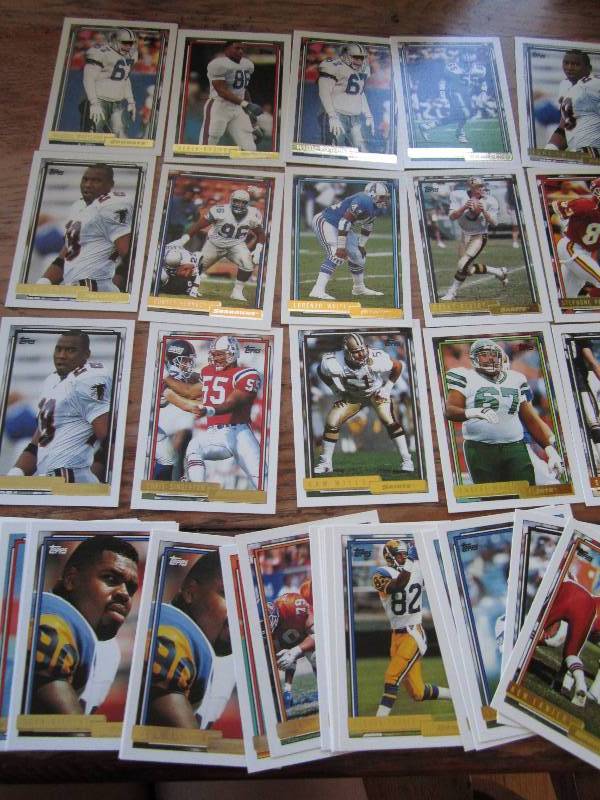 lot 5 image: Topps gold football cards...