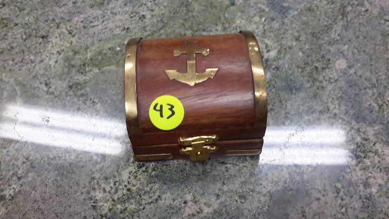 Small trunk with brass compass