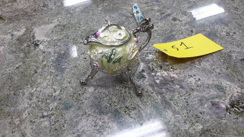 Vintage music box teakettle with butterfly