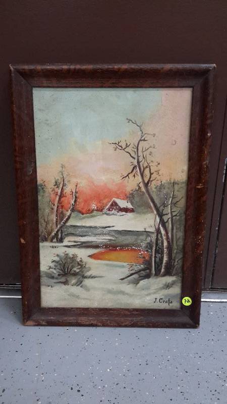 Framed painting of snowy countryside