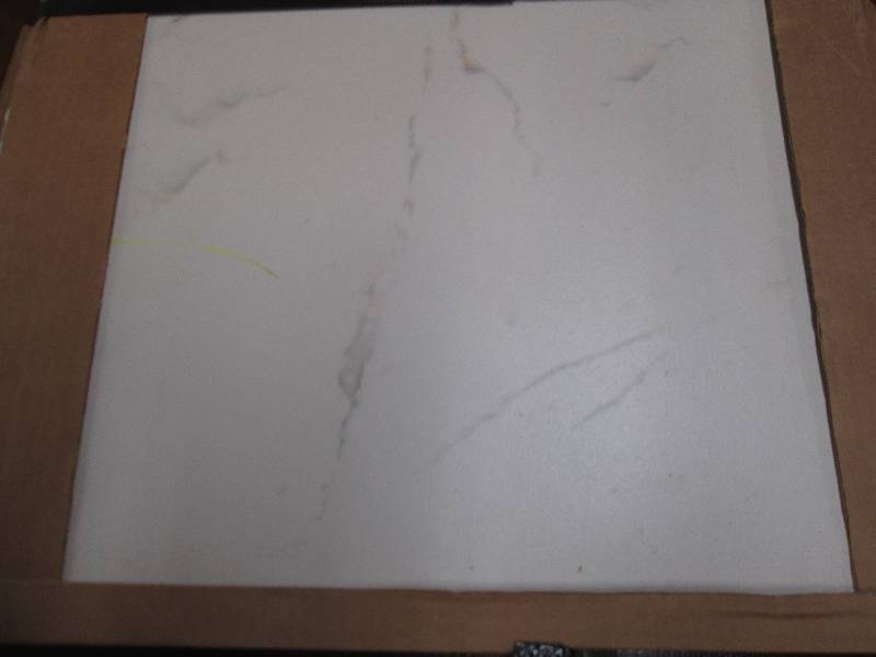 lot 106 image: 4 boxes  of 18x18 tile 7 pcs per bo...