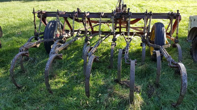 lot 5 image: Field Cultivator 8 McCormick  Mechanical lift on rubber