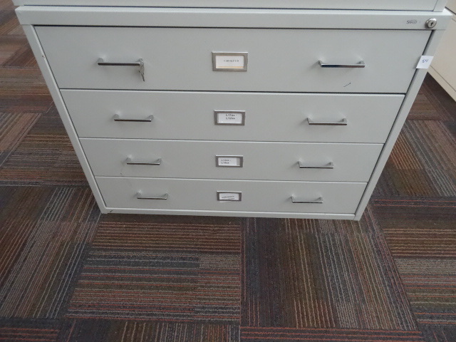 4 drawer metal cabinet. Great for parts or tools. With Key
