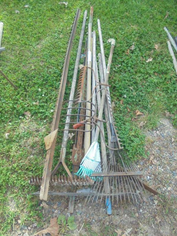 Lot - Long Handled Tools - Rakes, Posts, etc