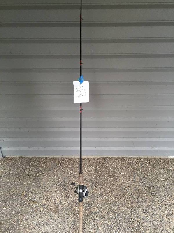 lot 33 image: HANK PARKER ROD AND BAIT CASTER REEL