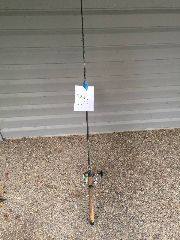 lot 34 image: FISHING ROD AND OPEN FACE REEL