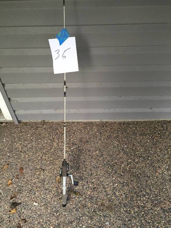 lot 35 image: FISHING ROD AND OPEN FACE REEL