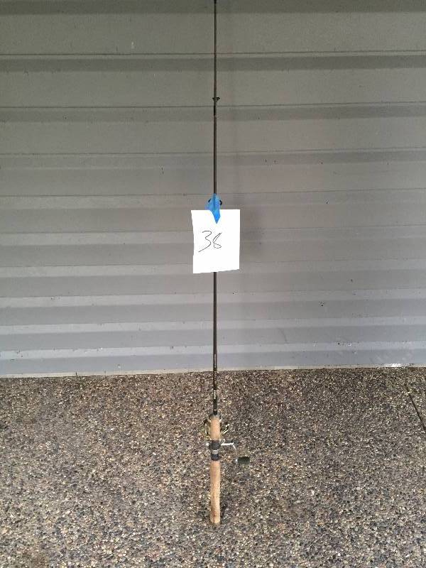 lot 38 image: FISHING ROD AND OPEN FACE REEL