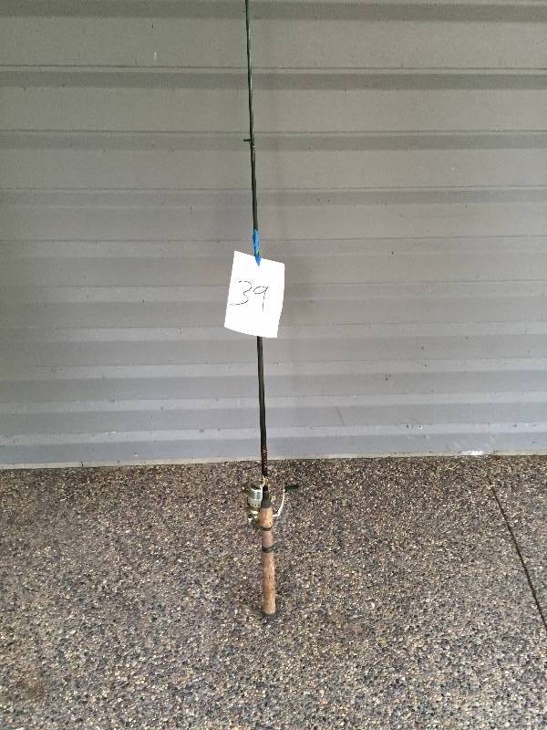 lot 39 image: FISHING ROD AND OPEN FACE REEL