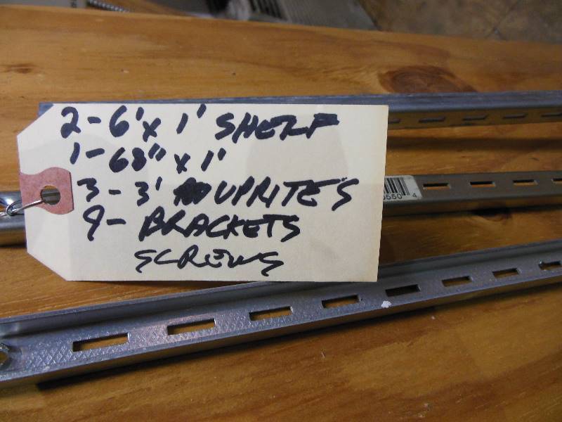 lot 269 image: Three Shelves, Three Uprights, and Nine Brackets with Screws