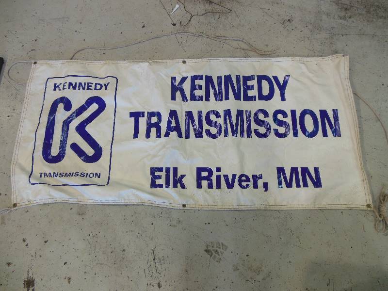 lot 79 image: 72 x 33 Vinyl Kennedy Transmission Sign