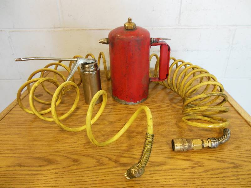 lot 81 image: Sure Shot, Oiler, and Air Hose