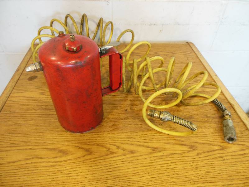 lot 82 image: Sure Shot and Air Hose