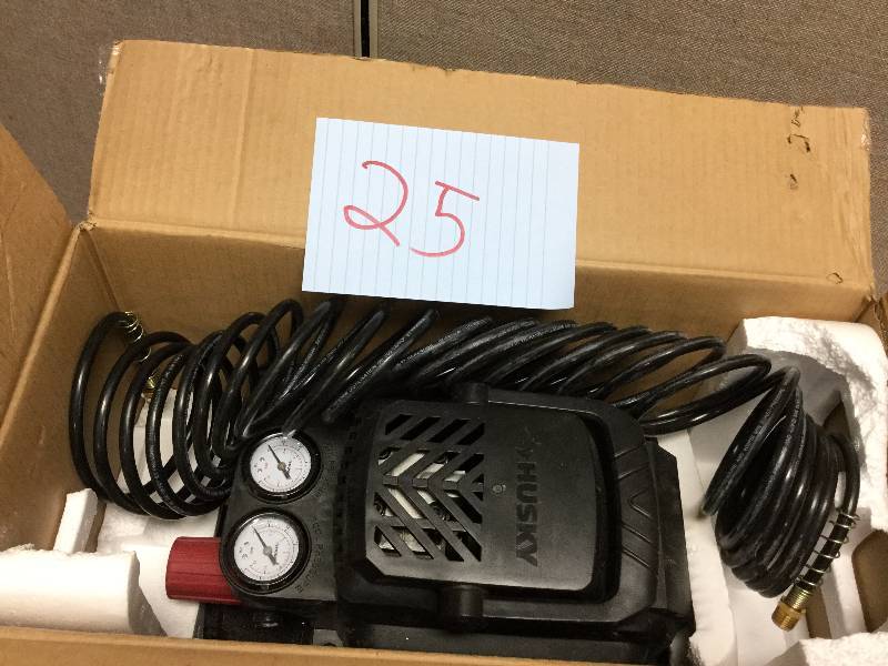 lot 25 image: Husky 2 Gal Oil Free Air Compressor Open Box in Like New Condition