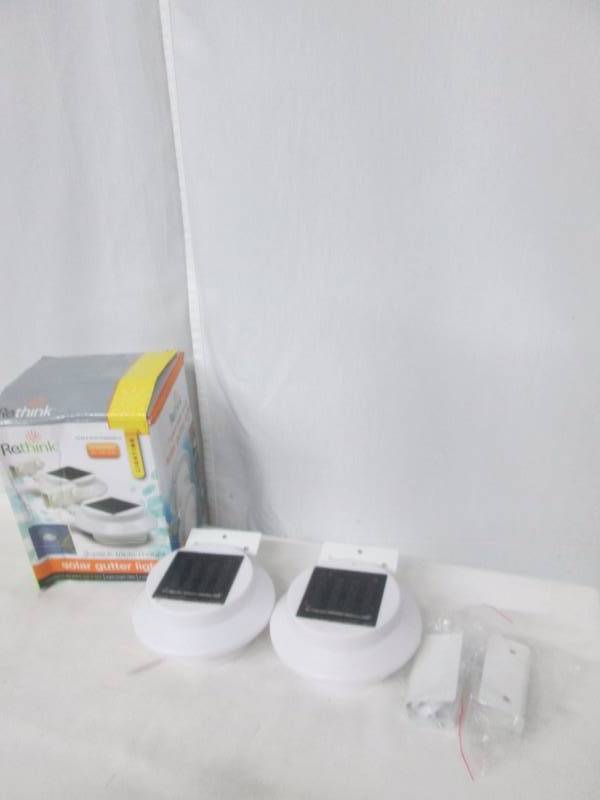 lot 68 image: Solar-Powered Outdoor Gutter Lights Pack of 2
