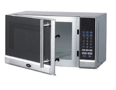 lot 63 image: Oster .7 cu. ft. 700W Microwave Oven