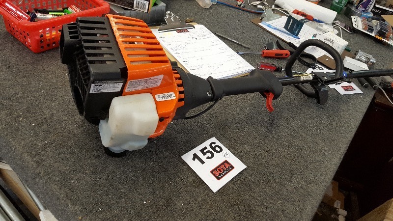lot 156 image: Remington 25cc 2-Cycle Gas 17 in. Straight String Trimmer