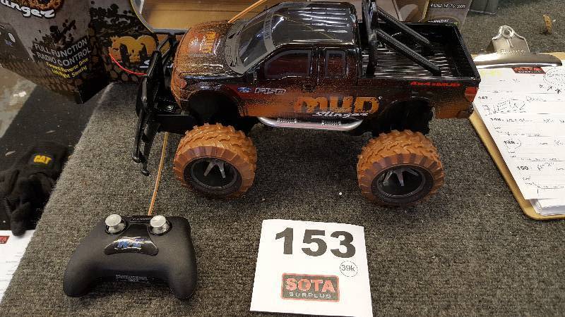 lot 153 image: New Bright 115-Scale Mud-Slinger Ford Remote-Controlled Truck