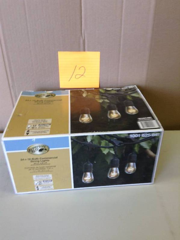 lot 12 image: Hampton Bay 24 ft. Black Commercial String Light- open box never used this is not a return