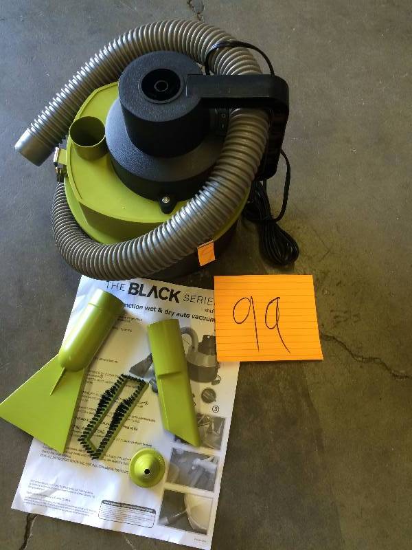 lot 99 image: Black series Wet and Dry Auto Vacuum Open box in like new condition
