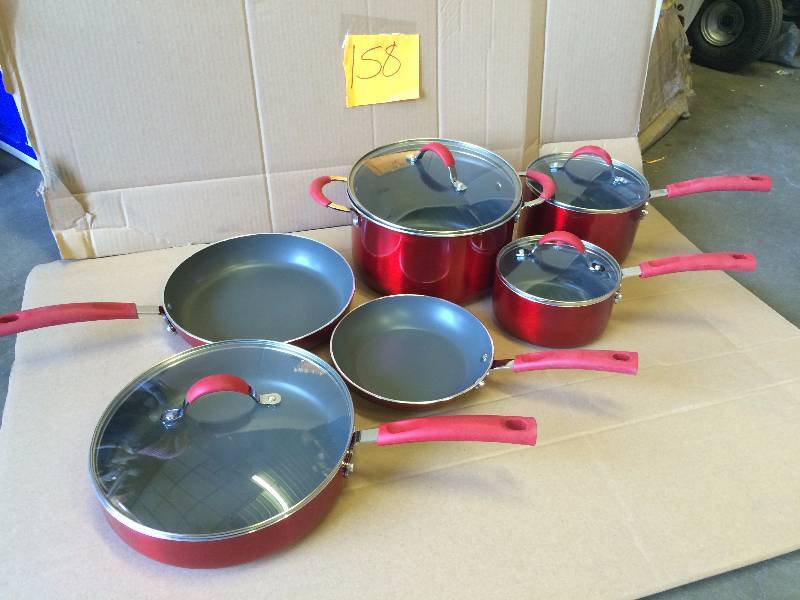 lot 158 image: Food Netwok 10 PC cookware set - never used - cover for large skilet has a small inner dent see pictures