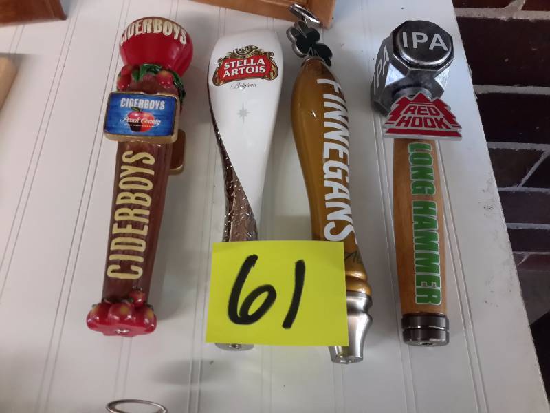 lot 61 image: 4 Beer Tapper handles as shown
