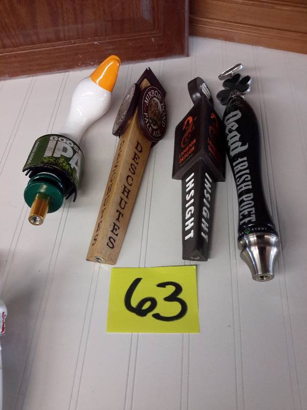 lot 63 image: 4 Beer Tapper handles as shown