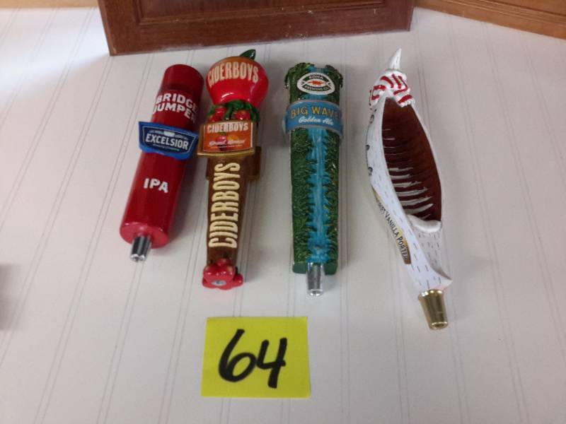 lot 64 image: 4 Beer Tapper handles as shown