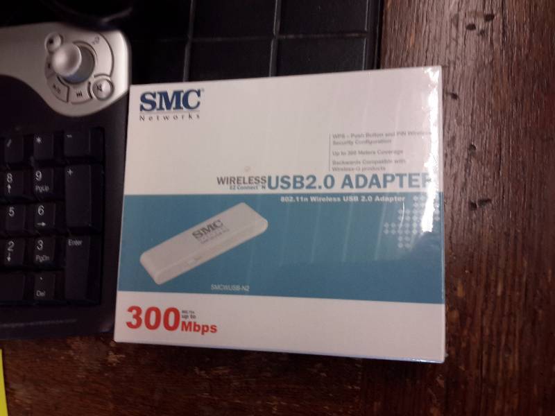 lot 93 image: 17in DELL, Flat Screen Monitor, Cordless Keyboard, SMC 300 MBPS, USB 2.0 Adapter